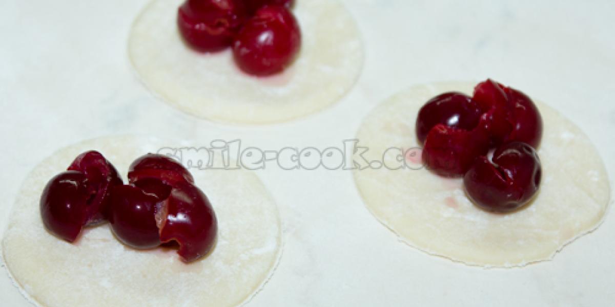 molding dumplings with cherries