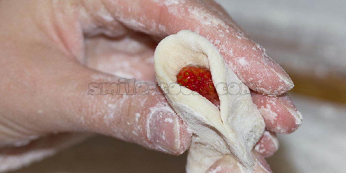 molding dumplings with strawberries